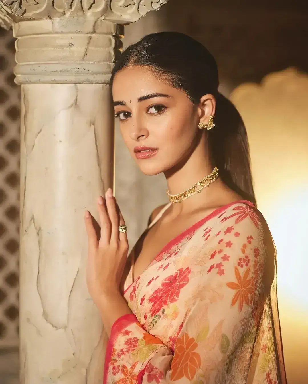 Indian Actress Ananya Panday in Sleeveless Orange Saree